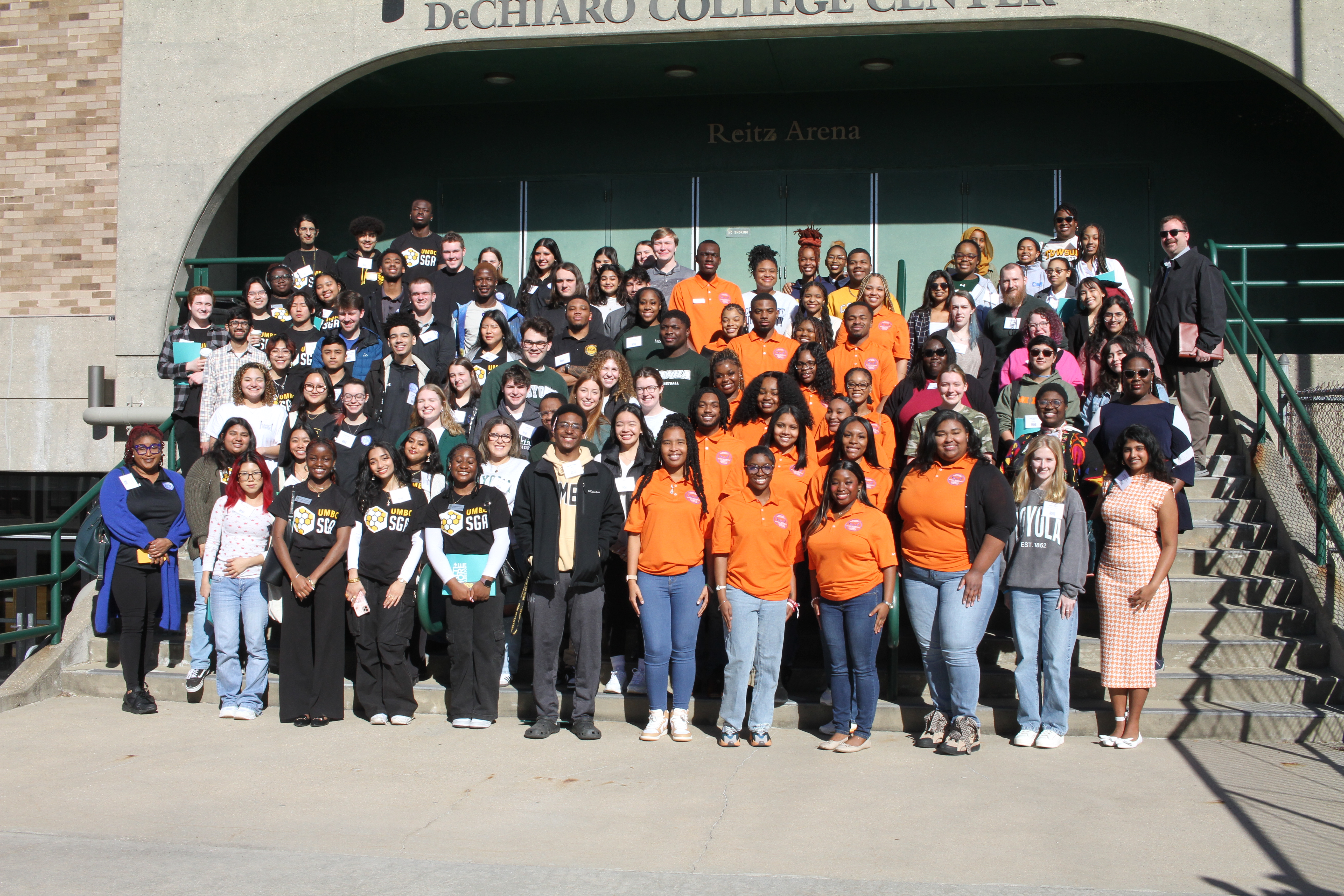 Students at the SGA Summit from 2024 smile in a group photo