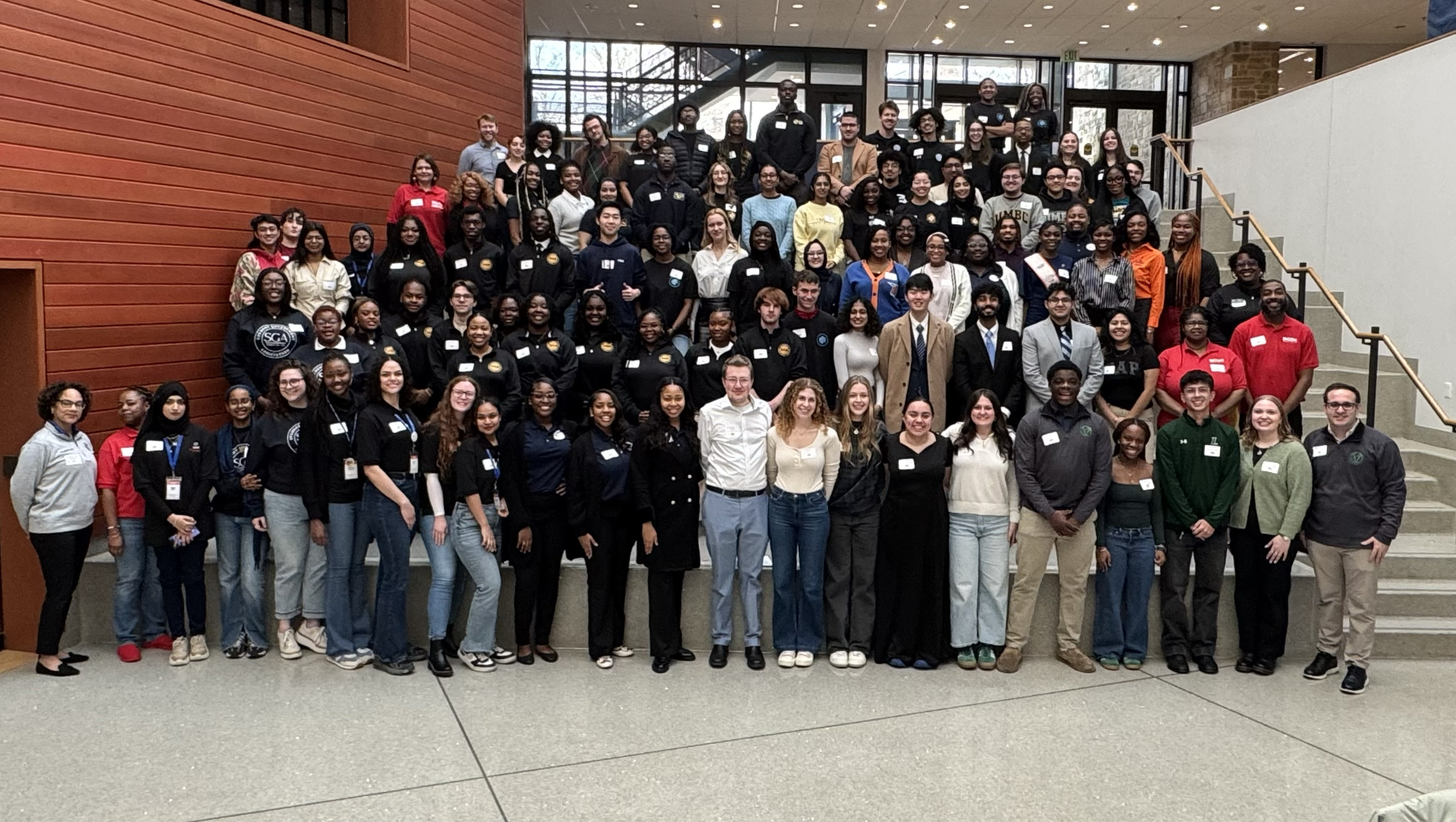 Students smiling for a group photo at the 2025 SGA Summit